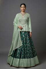 Teal Green Brocade Banarasi Silk Floral Woven Lehenga with Peplum Blouse