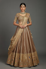 Chocolate Brown Munga Silk Woven Lehenga with Zardosi Beaded Work and Peacock Motif Broad Border