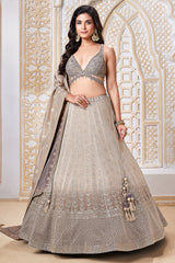 Taupe and Brown Tissue All Over Sequin Embroidered Lehenga with V Neck Crop Top