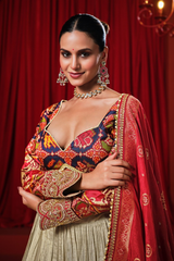 Cream and Gold Tissue Lehenga with Patola Choli and Rust Red Embroidered Dupatta