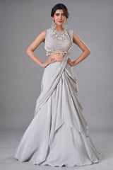 Ivory White Pre-Draped Lehenga featuring heavily Embroidered Pearl Fringe Blouse with Attached Dupatta