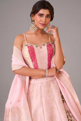 Pastel Pink Brocade Lehenga Set featuring Paneled Multi-Tonal Woven Corset and Banarasi Dupatta