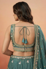 Deep Rama Tissue Lehenga Choli with Scenic Peacock & Animal Motif Embroidery