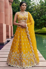 Mustard Tissue Lehenga Choli with Pastel Floral & Mirror Work