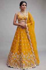 Mustard Tissue Lehenga Choli with Pastel Floral & Mirror Work