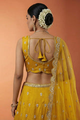 Vibrant Mustard Yellow Chinon Silk Lehenga Choli with Pearl & Sequin Woodland Motifs