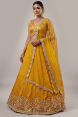 Vibrant Mustard Yellow Chinon Silk Lehenga Choli with Pearl & Sequin Woodland Motifs