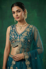 Teal Blue Tissue Lehenga Choli with Scalloped Jharokha and Peacock Embroidery