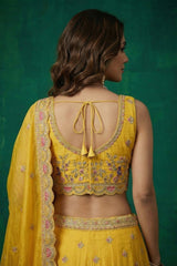 Bright Yellow Tissue Lehenga Choli with Elephant and Peacock Heritage Embroidery