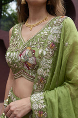 Pista Green Tissue Lehenga Choli with Botanical Embroidery and Tassels