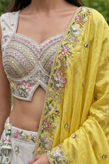 Off White Lehenga Choli with Floral Embroidered Border