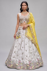 Off White Lehenga Choli with Floral Embroidered Border