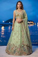 Pista Green Lehenga Choli with Peacock Floral Border