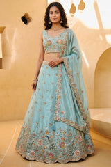 Celestial Sky Blue Lehenga Choli with Peacock Floral Border