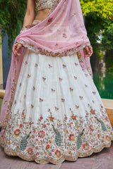 Off White Lehenga Choli with Peacock Floral Border