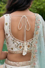 Off White Lehenga Choli with Peacock Floral Border