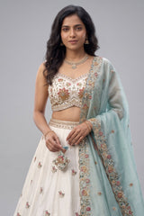 Off White Lehenga Choli with Peacock Floral Border