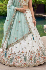 Off White Lehenga Choli with Peacock Floral Border