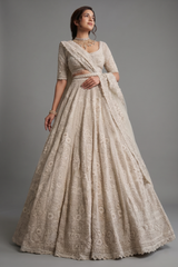 Off White Heavy Dori Embroidery Sequin Worked Lehenga in Net with Paisley and Floral Motifs