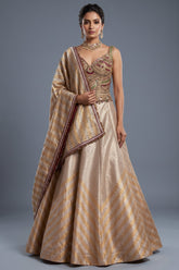 Golden Tissue Silk Lehenga with Kundan Worked Corset