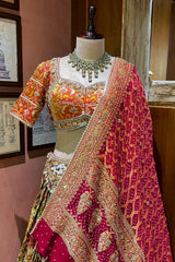 Cream and Golden Tissue Silk Heritage Patola Lehenga with Hand-Embroidered Zardosi Blouse and Georgette Bandhej Dupatta