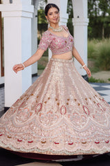 The Onion Pink Banarasi Brocade Silk Lehenga with Scalloped Crossover Choli and Handwork