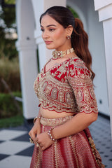 The Majestic Maroon Banarasi Silk Bridal Lehenga Ensemble with Jharokha Zardosi Blouse and Sheer Scalloped Veil