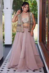 Muted Mauve Tissue Asymmetric Layered Lehenga Set With Heavily Embroidered Fusion Jacket