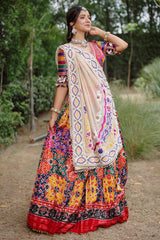 The Rajwadi Patola Silk Lehenga Ensemble With Scalloped V-Neck Hand-Embellished Blouse And Sheer Organza Tissue Dupatta