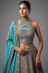 Firuza Blue Silk Pichwai Printed Lehenga with Mirror and Sequin Embroidered Halter Blouse