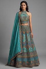 Firuza Blue Silk Pichwai Printed Lehenga with Mirror and Sequin Embroidered Halter Blouse