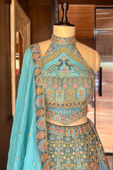 Firuza Blue Silk Pichwai Printed Lehenga with Mirror and Sequin Embroidered Halter Blouse