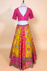 Mustard Yellow and Fuchsia Multi-Calidaar Printed Lehenga with Encrusted Cutdana Mirror Work Choli