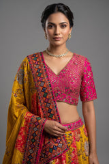 Mustard Yellow and Fuchsia Multi-Calidaar Printed Lehenga with Encrusted Cutdana Mirror Work Choli