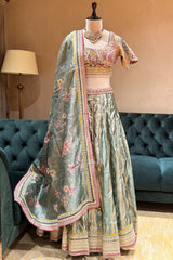Mint Green Tissue Zari Woven Flared Lehenga with Multi-Textured Lace and Pearl Bustier