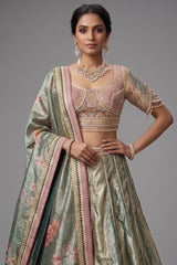 Mint Green Tissue Zari Woven Flared Lehenga with Multi-Textured Lace and Pearl Bustier