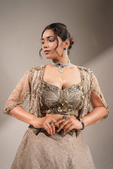 Metallic Taupe Fusion Lehenga Set featuring Cutdana Bodice and Sheer Embroidered Cape