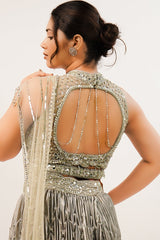 Metallic Green Smocked Satin Lehenga Set with Mirror-Embellished High-Neck Blouse