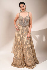 Champagne Beige Net Lehenga featuring Linear Sequin Trails and Beaded Tassel Bustier