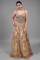 Champagne Beige Net Lehenga featuring Linear Sequin Trails and Beaded Tassel Bustier