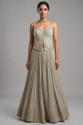 Cream Tissue Woven Pelated Lehenga with Mirror Work Blouse