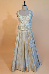 Cream Tissue Woven Pelated Lehenga with Mirror Work Blouse