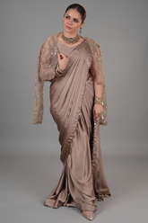 Taupe Satin Silk Pre Stitched Saree Featuring with a Narrow Embellished and Cutdana Short Cape Jacket
