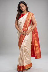 Cream Kanchipuram Saree Featuring Intricate All-Over Brocade Weaving With Red Accent Border
