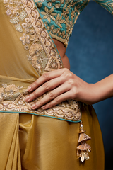 Mustard Gold Saree With Contrasting Turquoise Blue Embroidered Blouse In Cutdana Work