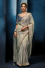 Pastel Mint Grey Organza Saree with Midnight Blue Peacock Embroidered Blouse