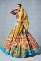 Orange and Yellow Banarasi Silk Hand Paint Ghat Inspired Lehenga