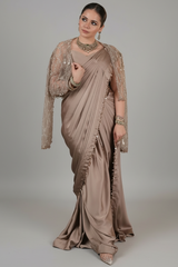 Taupe Satin Silk Pre Stitched Saree Featuring with a Narrow Embellished and Cutdana Short Cape Jacket