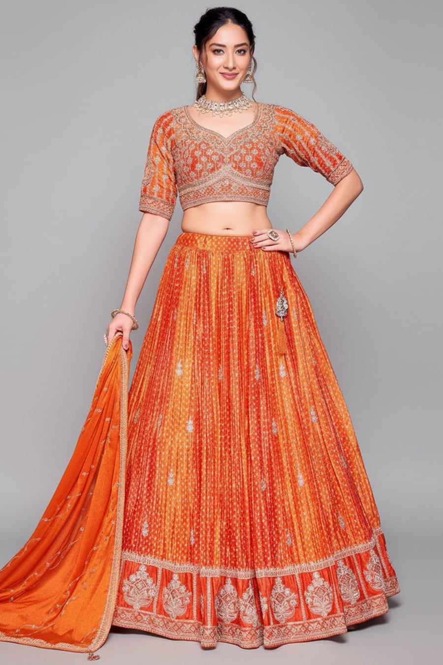 Orange Chinon Crepe Silk Bandhej Print Lehenga with Sequin Embroidery Work from Asopalav