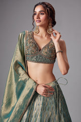 Teal Green and Golden Tissue Lehenga with Handworked Blouse
